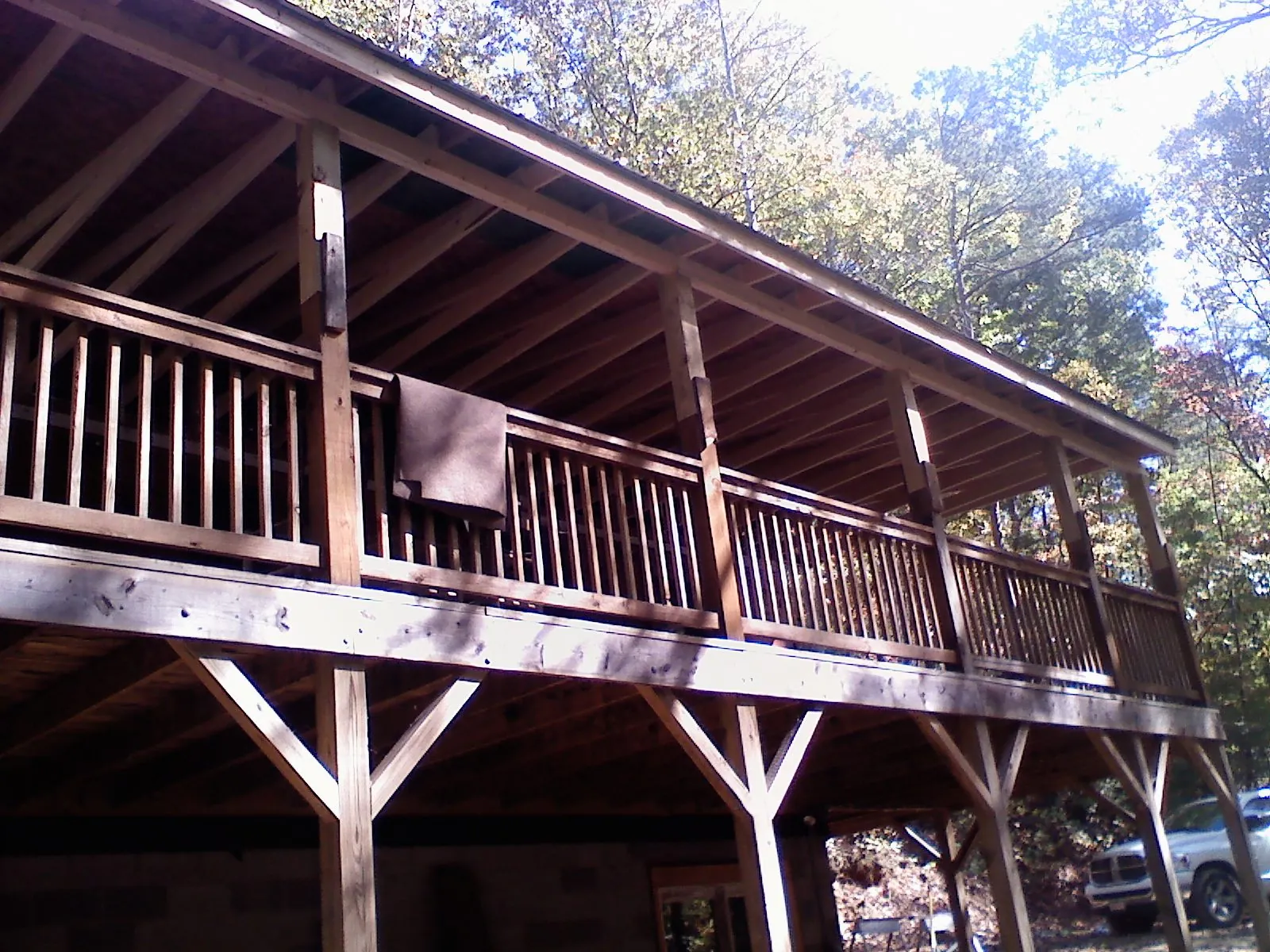 Timber framing under a new elevated porch and deck — Roof Leak Repair in Lafayette by Roofing Brothers